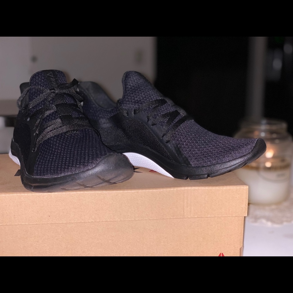 Women’s Reebok running sneakers.